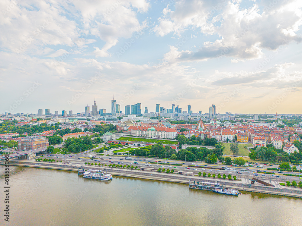 Aerial panorama of Warsaw, Poland over the Vistual river and City center in a distance. Downtown skyscrapers cityscape. Business