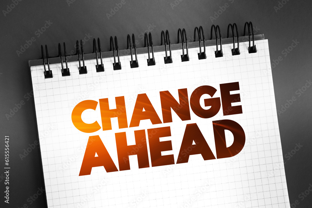 Fototapeta premium Change Ahead text quote on notepad, concept background