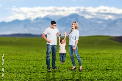 Happy family play together in the park