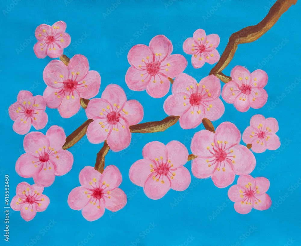 Branch with pink peach flowers on blue