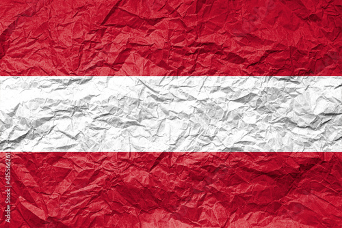 Flag of Austria on crumpled paper. Textured background.