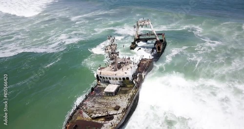 4K Aerial drone footage of an Abandoned Shipwreck Zeila on Famous Skeleton Coast, Namibia. Namibian Atlantic coastline, Zeila L-758 Walvis Bay stranded rusty ship at sand beach in Skeleton Coast Park photo