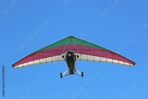 Valokuva Ultralight airplane flying in a blue sky