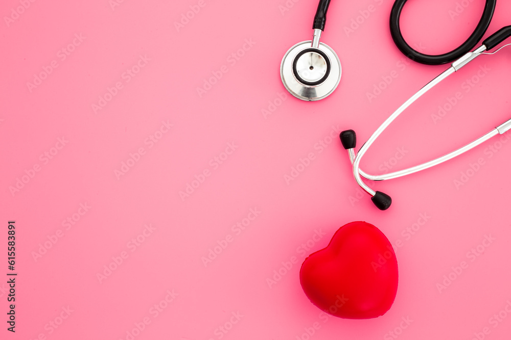 Fototapeta premium Red heart and medical stethoscope, medical and health care concept