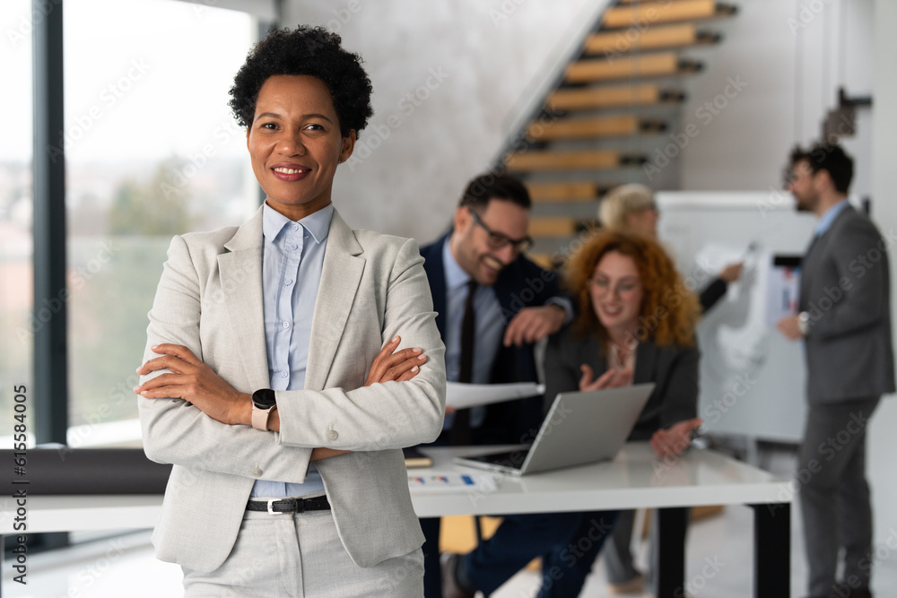 Naklejka premium Portrait of confident businesswoman at startup company