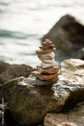 stone tower on beach (ID: 615586092)