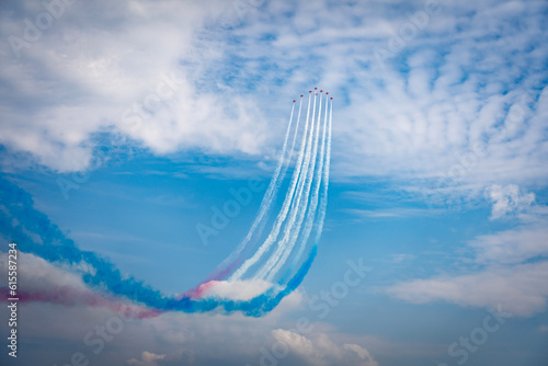 Aircraft in formation at an air show away from the camera
