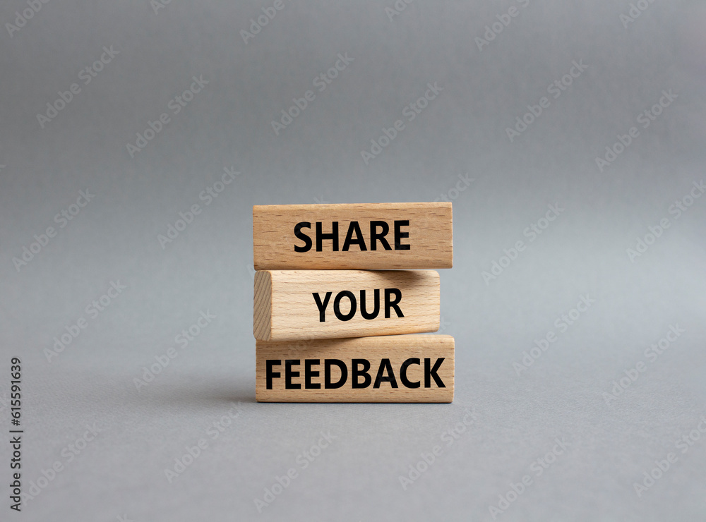 Feedback symbol. Concept word Share your feedback on wooden blocks. Beautiful grey background. Business and Ask for feedback concept. Copy space Feedback symbol. Concept word Share your feedback on wooden blocks. Beautiful grey background. Business and Ask for feedback concept. Copy space