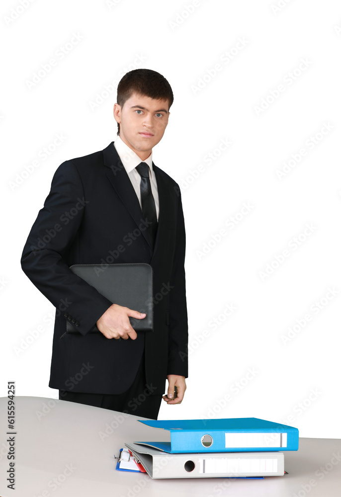 Businessman Standing Behind Table and Holding Organizer - Isolated Businessman Standing Behind Table and Holding Organizer - Isolated