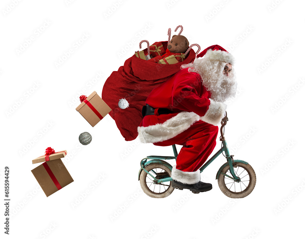 © alphaspirit - Santaclaus rides bike to deliver fast christmas gifts