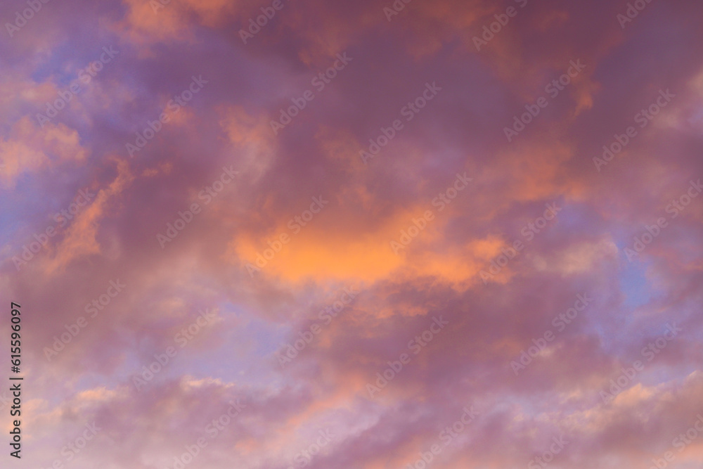 Beautiful sky background. Orange and purple sunset. Texture for you design