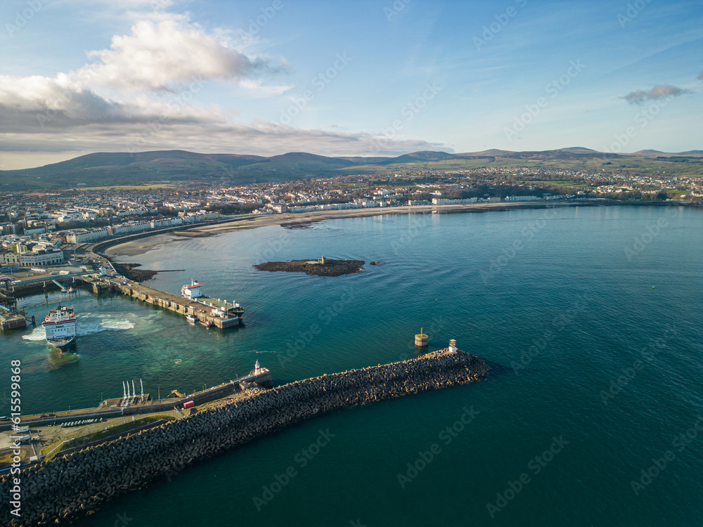 Douglas, Isle of Man - 25 March 2023: view of Douglas Bay with the entrance to Douglas South Quay Harbour, Isle of Man Sea Terminal, and Central Promenade