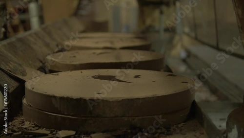 dolly close up shot of pressed cocoa discs