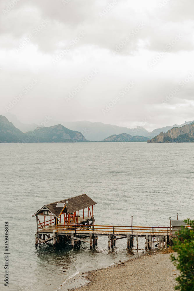 Naklejka premium Dock, Mountain and lake