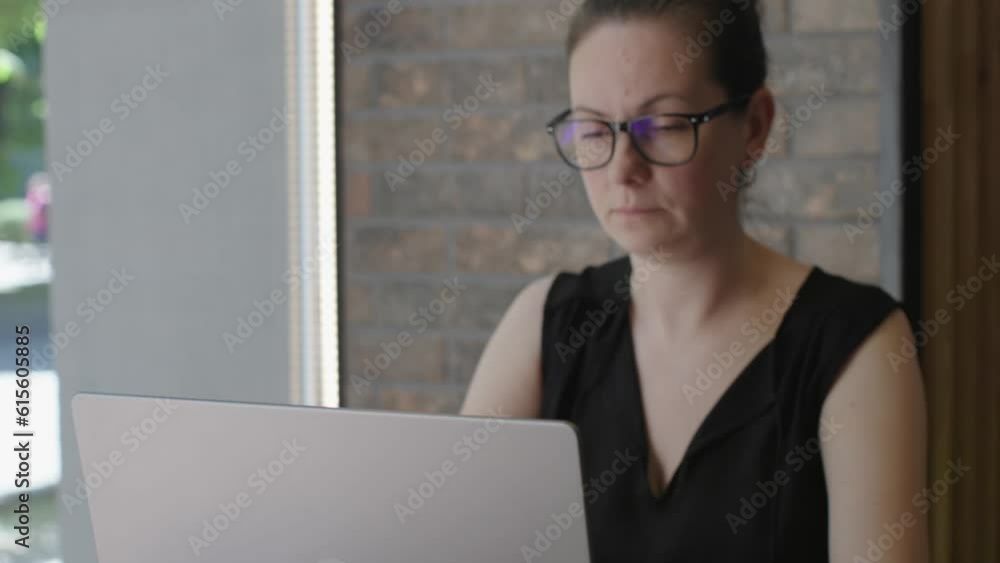 pensive woman business work sit window reflect, think, look solution difficult task, training, project concept middle-aged female glasses holds pen hands touches lips thoughts. idea solution problem pensive woman business work sit window reflect, think, look solution difficult task, training, project concept middle-aged female glasses holds pen hands touches lips thoughts. idea solution problem