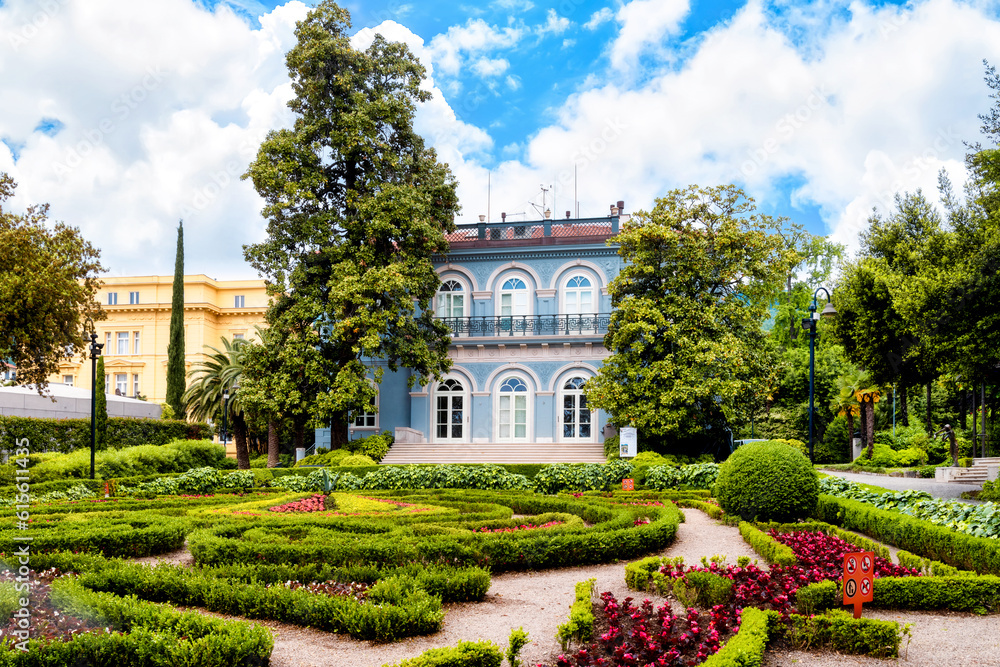 Villa Angiolina with beautiful flowerbeds in front of the house, Croatia