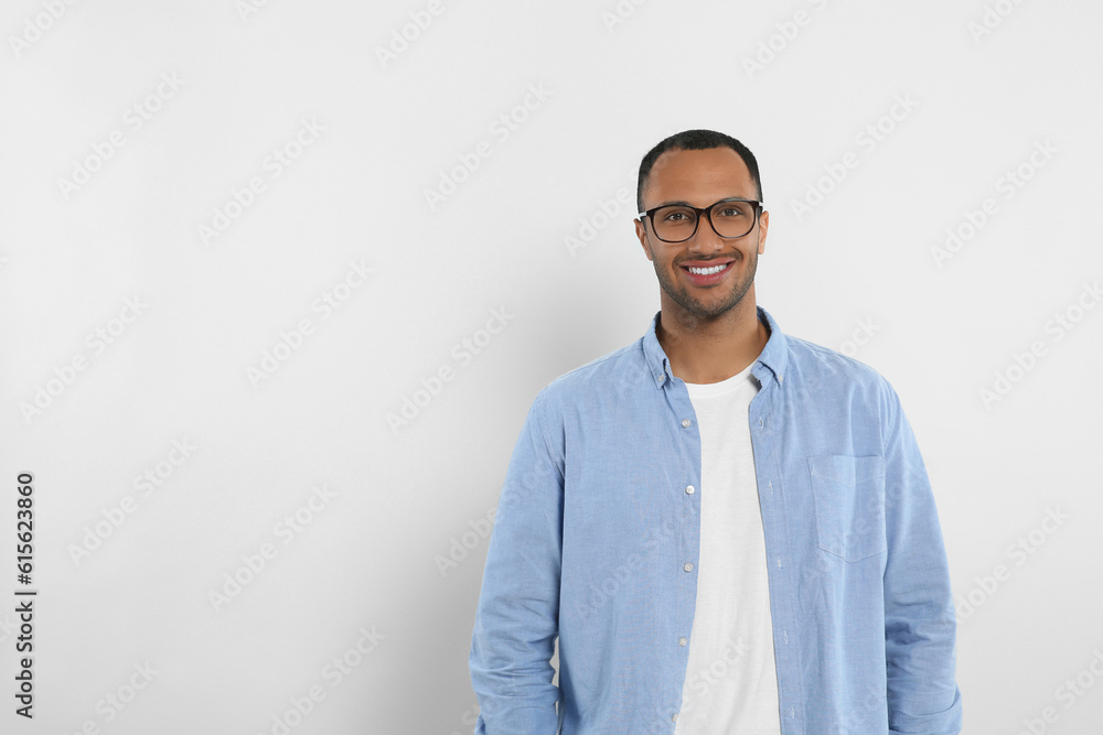 Portrait of handsome young man on white background, space for text Portrait of handsome young man on white background, space for text