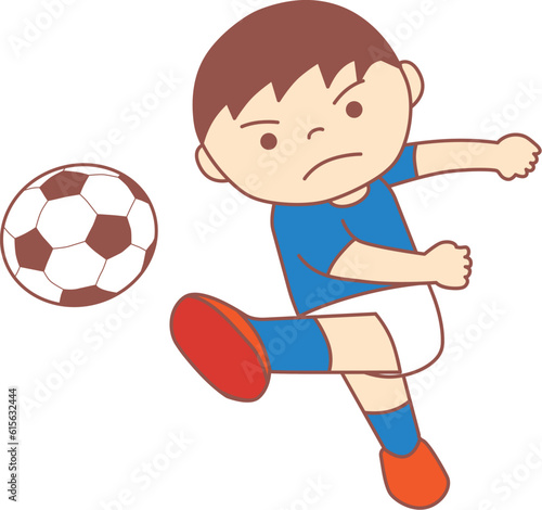 サッカーでシュートをする子供