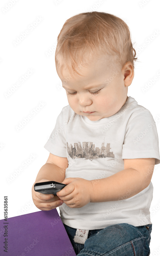 Baby boy holding a mobile phone Baby boy holding a mobile phone