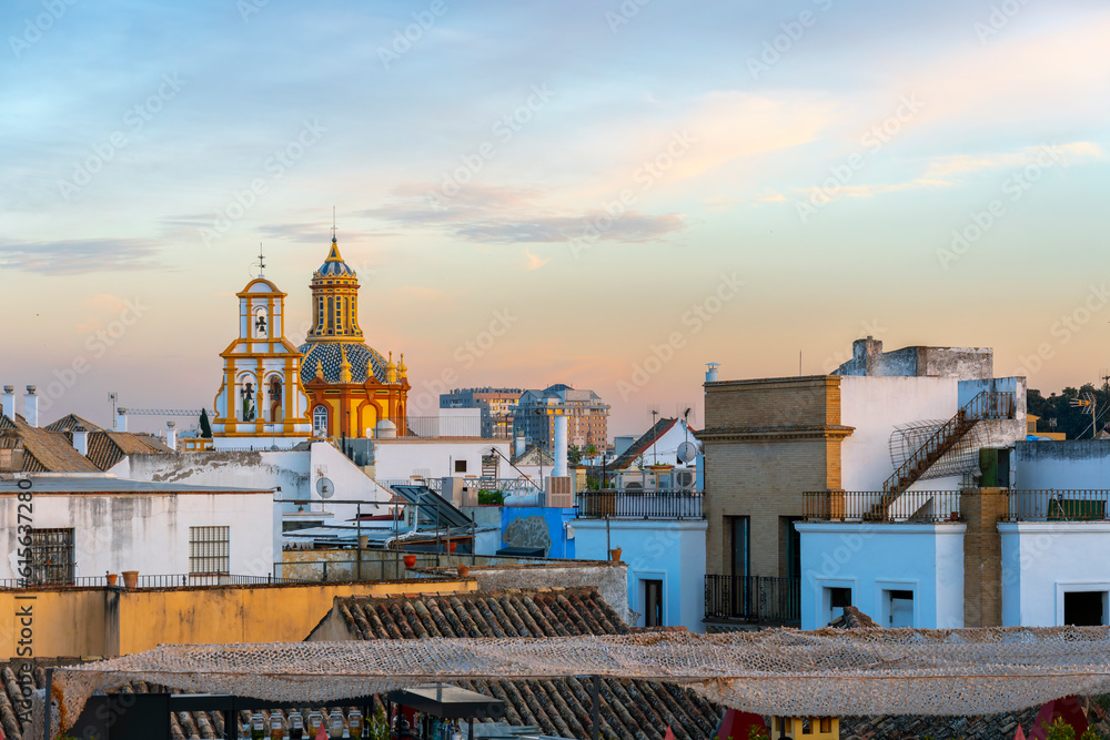 View of the Iglesia de Santa Cruz or Holy Cross Church from a rooftop in the historic Barrio Santa Cruz district of Seville, Spain.