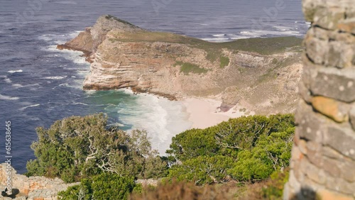 Little beach between mountains at ocean at cape point national park