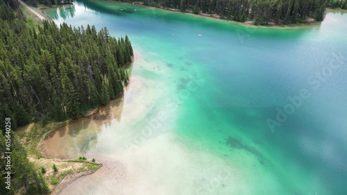fly over lake two jack, beautiful turquoise water color, kayaking on the lake, Banff National Park, Alberta, Canada photo