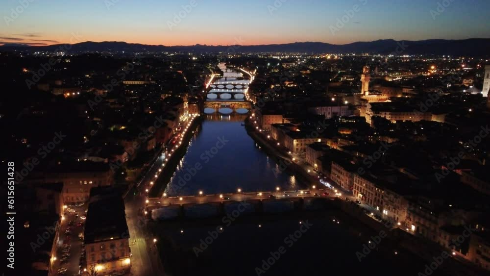 Florence,Italy, Ponte Vecchio, river and city view at night Florence,Italy, Ponte Vecchio, river and city view at night