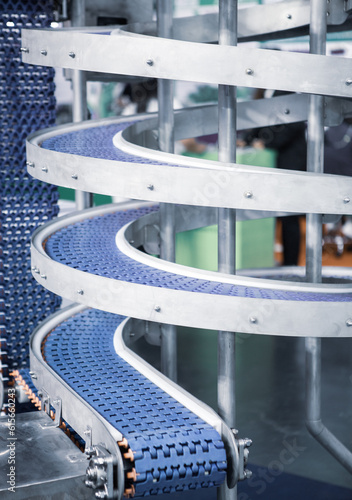 Empty plastic belt conveyor in production line. Food industry.