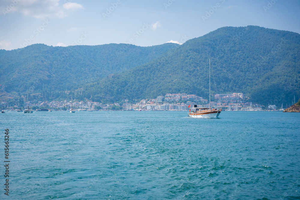 Boat leaving the Marina towards the open sea in the morning