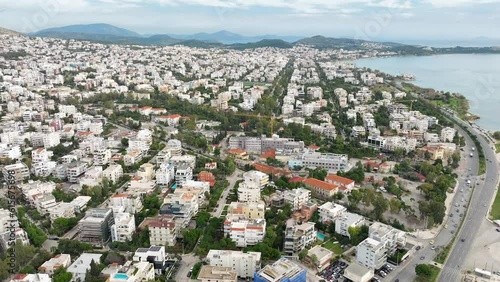 Drone flyover waterftront Glyfada cityscape, Greece photo