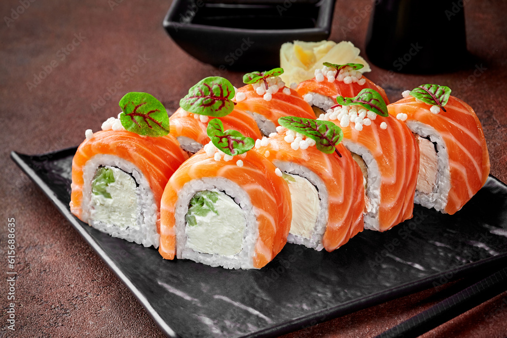 Philadelphia rolls with salmon served with gari and soy sauce Philadelphia rolls with salmon served with gari and soy sauce