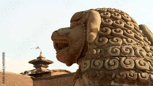 CU A lion statue on Bhaktapur Durbar Square, Kathmandu, Nepal photo