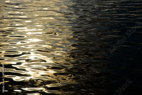 Light reflected on the water in the evening