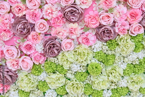 Rose flower background material produced with artificial flowers.