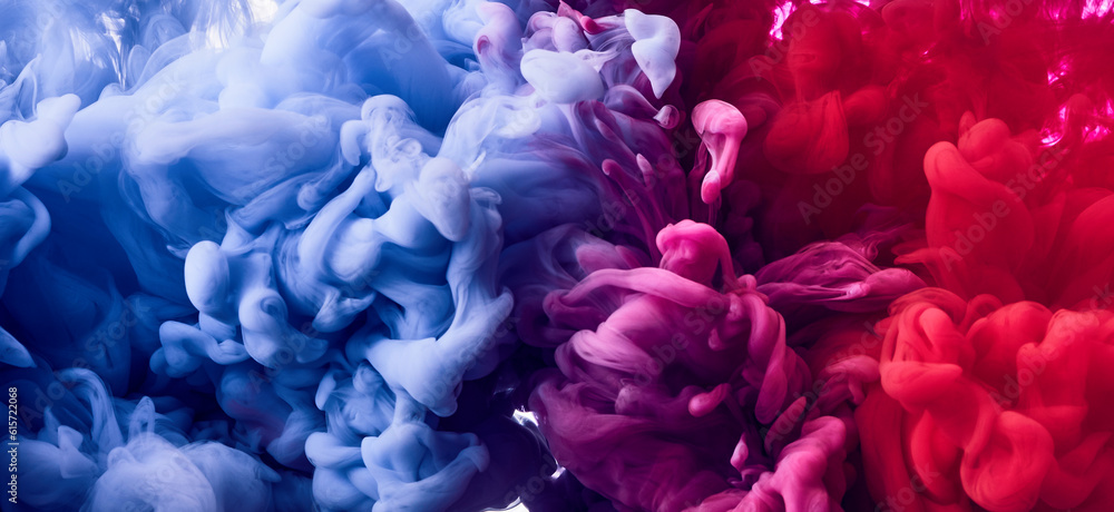 Obraz premium Splash of blue and pink paint in water over white background