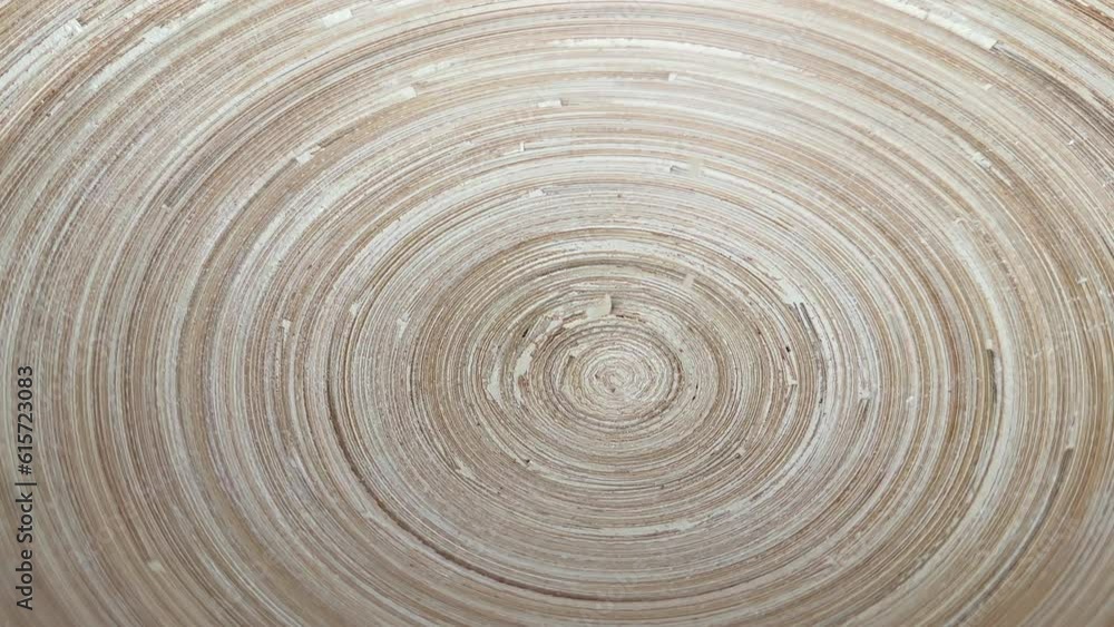 Japanese raw rice grain for sushi or risotto falling into a bamboo bowl. Japanese raw rice grain for sushi or risotto falling into a bamboo bowl.