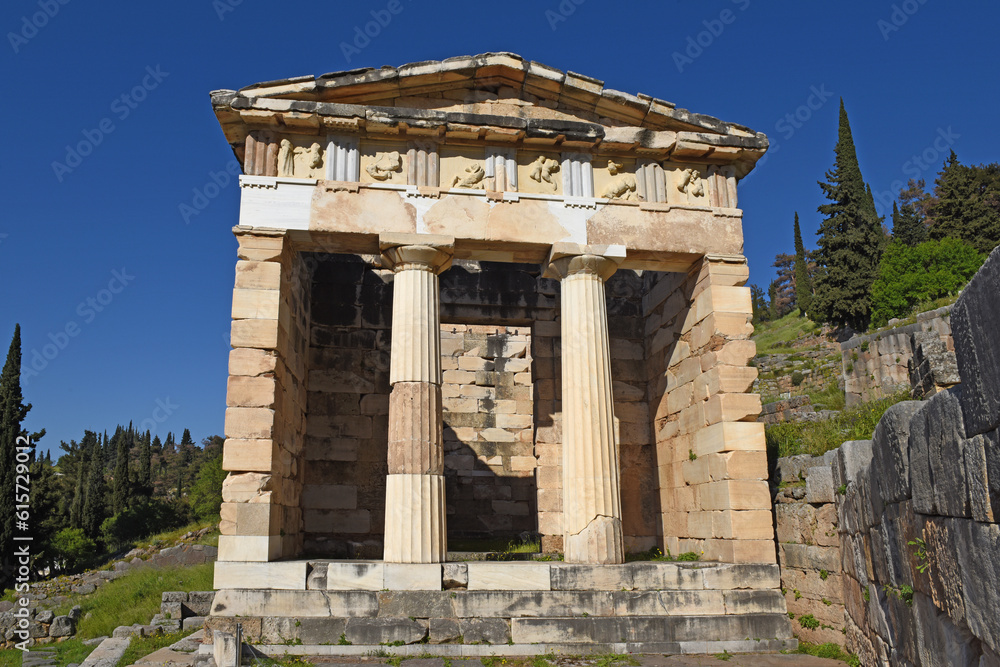 view to the Athenian treasury at the ancient oracle archaeological Delphi site, Greece
