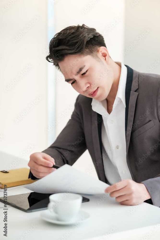 Stressed business man working in the office. Stressed business man working in the office.