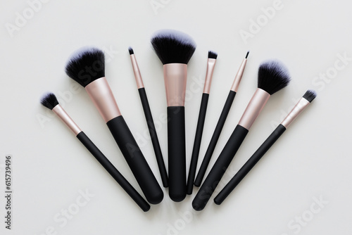 set of makeup brushes over white