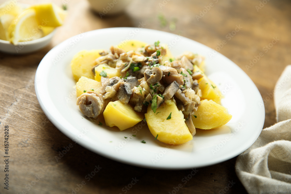 Boiled potato with mushroom ragout