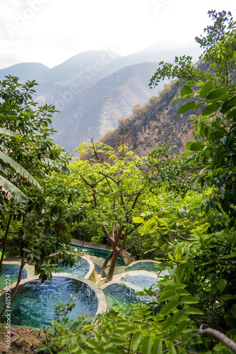 Scenic Tolantongo Grutas in Mexico, a breathtaking natural landscape with lush plant life