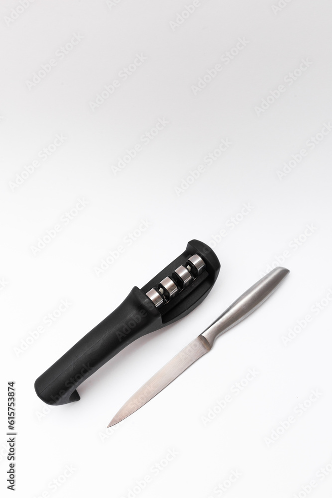 knife with sharper on the table knife with sharper on the table