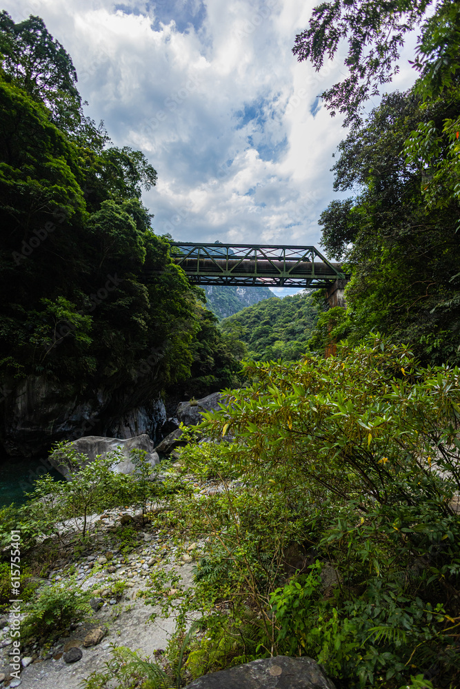 Shakadang hiking trail at the Taroko National Park Taiwan. The protected mountain forest landscape named after the landmark Taroko Gorge, carved by the Liwu River. Taiwan natural wonders and heritage. Shakadang hiking trail at the Taroko National Park Taiwan. The protected mountain forest landscape named after the landmark Taroko Gorge, carved by the Liwu River. Taiwan natural wonders and heritage.