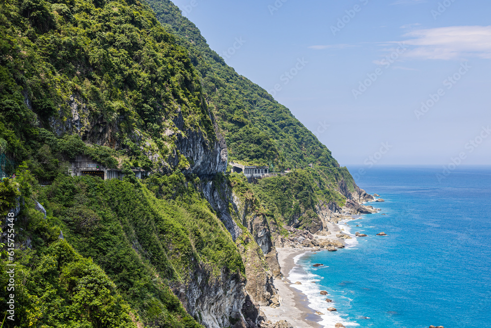 Stunning view reveals the grandeur of the cliffs at Taiwan southeast coast, Qingshui Cliff near Taroko National Park. Towering and lush, they overlook the azure sea, evoking a sense of awe. Landscape Stunning view reveals the grandeur of the cliffs at Taiwan southeast coast, Qingshui Cliff near Taroko National Park. Towering and lush, they overlook the azure sea, evoking a sense of awe. Landscape