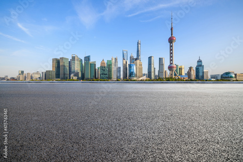 Canvas Print Asphalt road and city skyline with modern buildings in Shanghai, China
