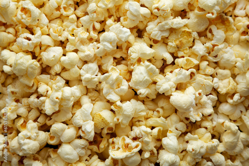 Homemade Buttered Popcorn with Salt Background Homemade Buttered Popcorn with Salt Background