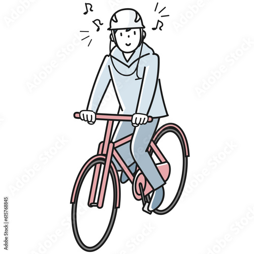 イヤホンで音楽を聴きながら自転車で走る若い男性
