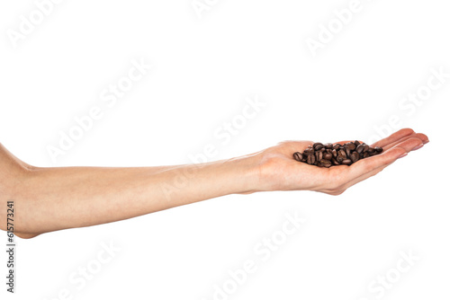 Coffee beans in female hands isolated on white background.