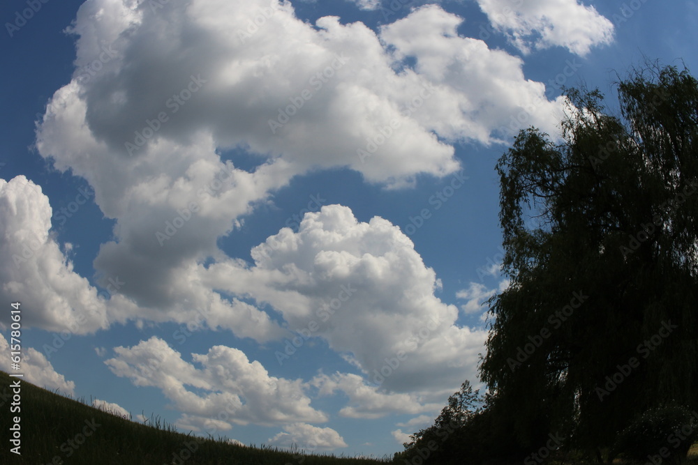 A cloudy sky over a mountain A cloudy sky over a mountain