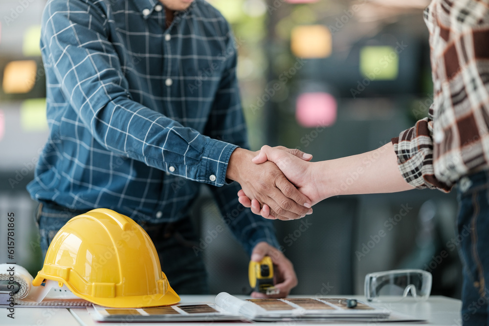 Two engineering man with construction worker greeting a foreman at renovating apartment. Two engineering man with construction worker greeting a foreman at renovating apartment.